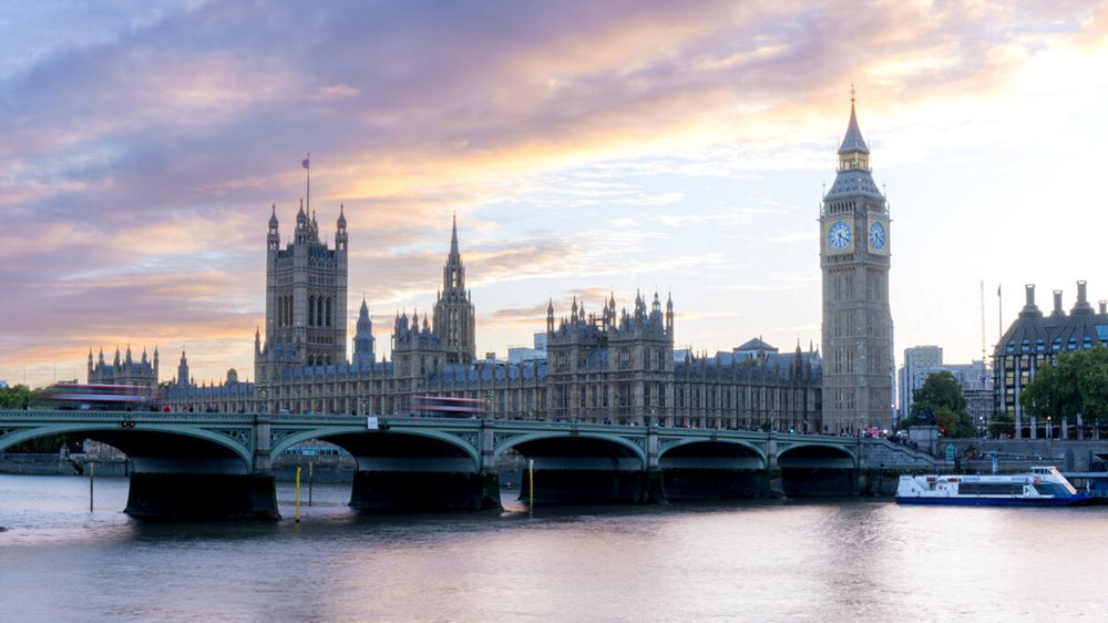 Palace of Westminster with Wesminster Bridge at sunset