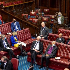 House of Lords members in the chamber as they debate the situation in Ukraine. Some members are wearing yellow and blue