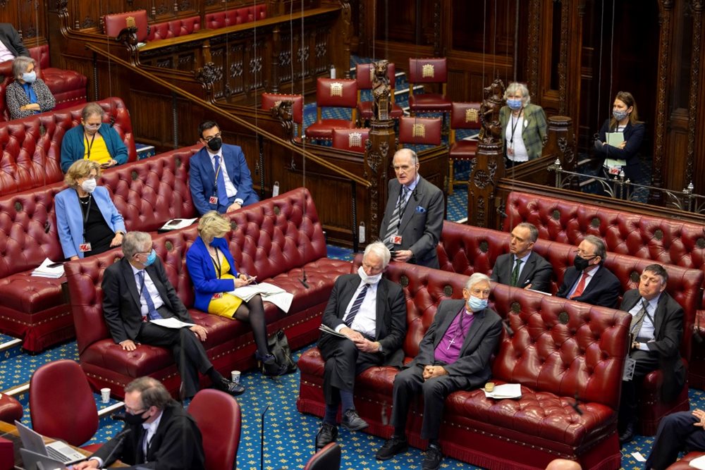 House of Lords members in the chamber as they debate the situation in Ukraine. Some members are wearing yellow and blue